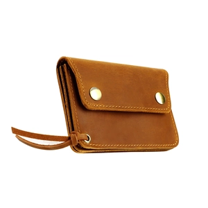 Close-up of vintage crazy horse leather wallet with dual metal buckles and hand stitching