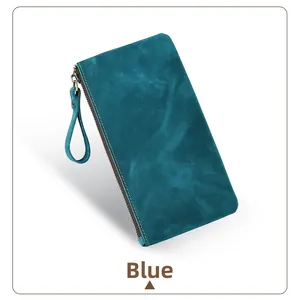 Close-up of blue crazy horse leather clutch with side wristlet and zipper detail