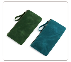 Detail view of premium matte crazy horse leather pouches with sturdy side wrist straps