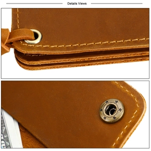 Close-up of vintage brown crazy horse leather wallet with handcrafted stitching and brass hardware