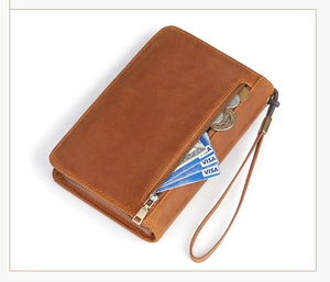 Brown vintage leather travel cigar case featuring card slots and zipper coin pocket