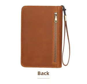Back view of vintage brown leather cigar travel case with zipper pocket and wrist strap