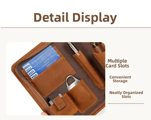Detailed internal view of brown leather cigar case featuring card slots and pen holder