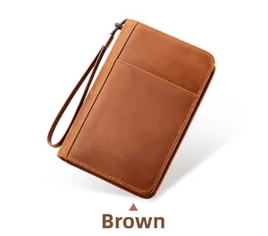 Brown vintage leather travel cigar case with wrist strap and premium stitching details