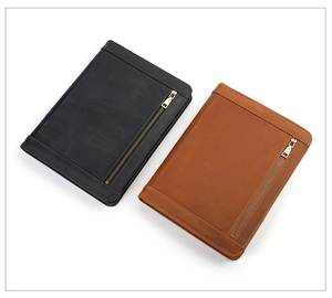 Detail of genuine leather iPad sleeves in black and brown with durable metal zippers