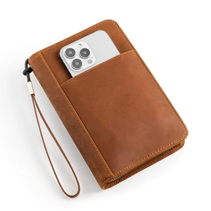Brown genuine leather cigar case with wrist strap and smartphone pocket holder