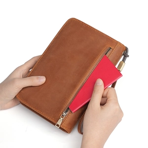 Brown genuine leather travel wallet clutch with wrist strap and zipper closure