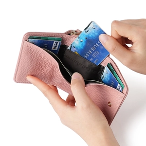 Pink lychee grain leather wallet with accordion card slots and zipper pocket for women