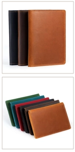Detailed view of handmade crazy horse leather passport holders in multiple vintage colors