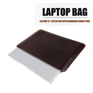 Detail of 14-inch leather laptop sleeve showing orange stitching and detachable handle