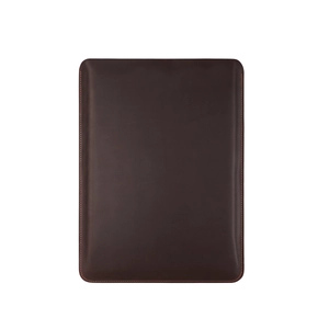 Detail of dark brown leather laptop sleeve with neat stitching for MacBook and Huawei