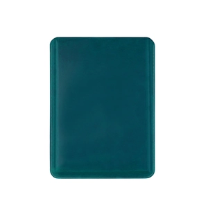 Macro shot of dark green crazy horse leather case with fine stitching for MacBook Pro 16