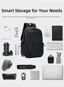 Flat lay of large capacity laptop backpack with organized office and tech accessories