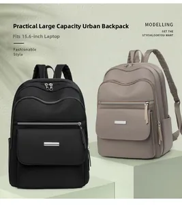 Detail showing high-capacity oxford backpacks in black and khaki for 15.6-inch laptop
