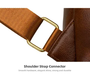 Detailed view of reinforced brown leather strap connection with golden metal buckle hardware