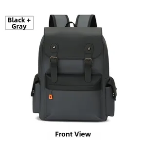 Detailed front view of black and grey travel backpack with orange zipper accents