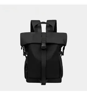Front view of a large black waterproof motorcycle backpack with roll-top and buckle closure