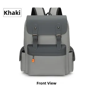 Front view of a khaki vintage backpack with dual buckles and orange zip detail