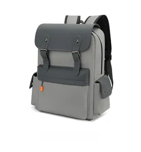 Detail of grey vintage backpack showing side pocket and 45-degree angle profile view