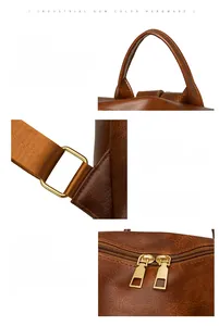 Detail view of reinforced handle, gunmetal hardware and dual zipper on brown leather backpack
