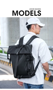 Close-up of black cycling backpack featuring durable buckles and side mesh pockets