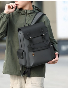 Close-up of waterproof vintage two-tone men backpack with buckled flap pockets