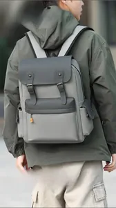 Detailed outdoor view of a vintage multi-pocket color-block travel backpack for men