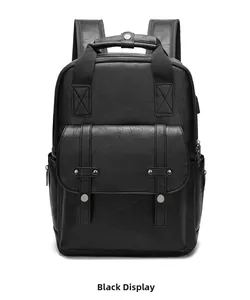 Front detail of black leather backpack with dual adjustable metal buckle straps