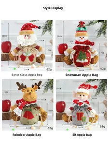 Detail of Christmas gift bags featuring Santa, snowman and reindeer with drawstring closure