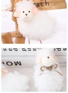 Detail of plush Easter sheep hanging ornament with soft white fleece and rustic twine bow