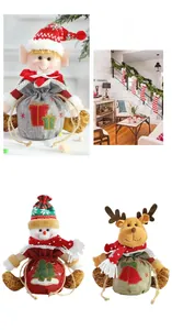 Detailed view of Christmas drawstring gift bags featuring elf, snowman and reindeer dolls