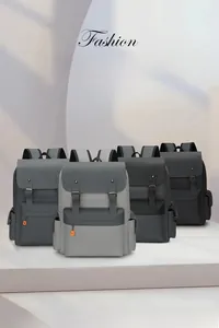 Detailed grid showing four colors of vintage business backpacks with double-buckle flap