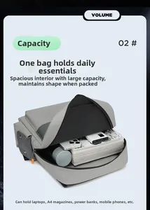 Internal view of a multi-pocket grey laptop backpack with large storage capacity