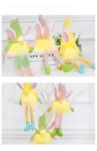 Detail of light-up Easter gnomes with rabbit ears and glowing LED bellies in pastel colors