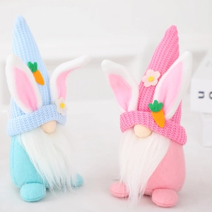 Set of two Easter bunny gnomes with knitted hats and carrots for home spring decor