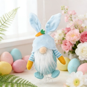 Blue Easter gnome hanging ornament with bunny ears and carrot decor in a spring scene