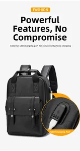 Close-up of the external USB charging port on the black vintage leather backpack
