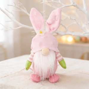 Detailed plush texture of Easter gnome with pink bunny ear hat and white floral accent