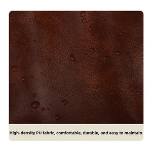 Macro shot of brown waterproof PU leather material showing water resistance and texture