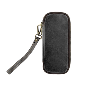 Detail of vintage leather pipe pouch showing orange stitching and bronze wrist strap clip