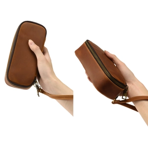 Vintage brown leather pipe and tobacco travel pouch with zipper and wrist strap