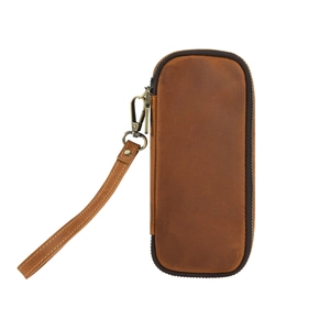 Vintage brown leather travel pipe pouch with bronze zipper and wrist strap on white background