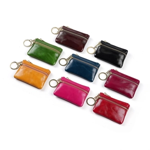 Portamonete in vera pelle in 8 colori assortiti con portachiavi dorati e chiusure a zip