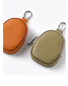Mini leather pouch with lychee texture, sturdy zipper and carabiner for keys and earbuds