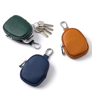 Mini genuine leather coin purse with zipper and carabiner in three distinct colors