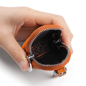 Genuine orange pebble leather mini pouch for coins and earphones with silver zipper