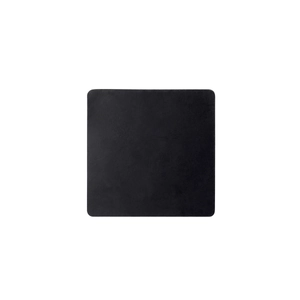 Macro detail of square black crazy horse leather coaster with soft rounded edges