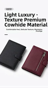 Detail of lychee pattern cowhide leather texture with zipper and snap button closure