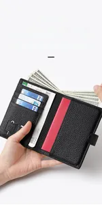 Detail view of leather travel wallet with RFID blocking slots for cards and passport