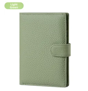 Detailed side view of a light green RFID leather wallet showing layered compartments